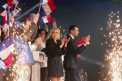 National Rally president Jordan Bardella and former president Marine Le Pen at a rally to launch the party's campaign for the European elections, in Marseille, 3 March 2024. | Photo: © Gonzalo Fuentes/Reuters 