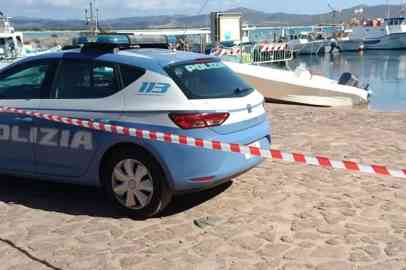 A police car at a port in Sardinia | Photo: Fabio Murru