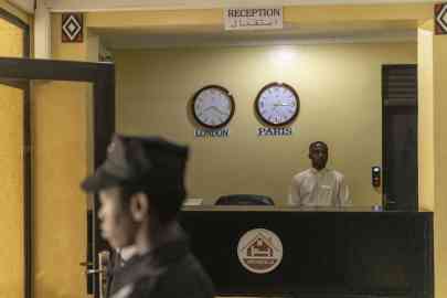 Staff stand at the reception at Hope Hostel, which is getting ready to host asylum seekers deported from the United Kingdom, in Kigali, Rwanda, on April 24 2024 | Photo: Guillem Sartorio / AFP
