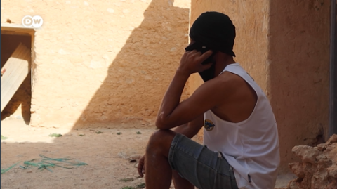 A screenshot of an alleged migrant smuggler from Tunisia, interviewed by DW | Source: DW report