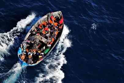 A migrant boat photographed from a finance police helicopter off Lampedusa | Photo: ANSA/CARMELO SUCAMELI
