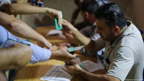 Palestinian youths try to obtain permission to leave Gaza through the Rafah border crossing with Egypt in September 2019 | Photo: Mohammed Al-Hajjar/DW