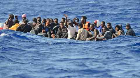 People from Africa seeking a better future in Europe — few images tell this story better than that of an overcrowded boat on the Mediterranean | Photo: Daniel Kubirski/picture alliance