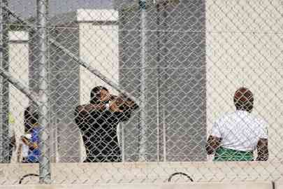 Migrants inside the center for asylum seekers for the expedited border procedures in Porto Empedocle, Sicily | Photo: ANSA / FRANCESCO RUTA
