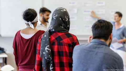 German classes and integration courses have played a large role in integration efforts in Germany | Photo: Markus Scholz/Picture-alliance