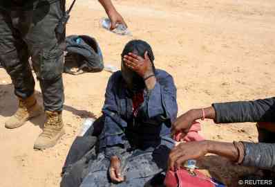 From file: A 20-year-old Ghanaian woman is found by Libyan border guards in 2023 after allegedly being pushed over the border from Tunisia | Photo: Hazem Ahmed / Reuters