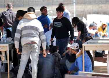 From file: Newly arrived migrants at a fishing point on the island of Cyprus in early April | Photo: Yiannis Kourtoglou / Reuters