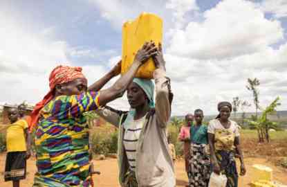 Women getting water at the refugee camp of Nakivale, in Uganda | Photo: UNHCR/ESTHER RUTH MBABAZI