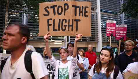 Protesters in front of the Home Office ahead of the first flight which was subsequently grounded | Photo: Reuters