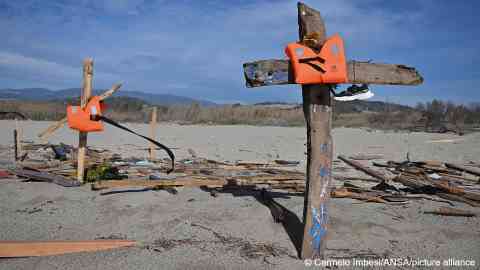 More than 3,100 migrants died or went missing while trying to cross the Mediterranean Sea in 2023. Among them were at least 94 migrants who died in a shipwreck off southern Italy in February 2023. The crosses were set up at the site of the shipwreck shortly after it happened | Photo: Carmelo Imbesi/ANSA/picture alliance