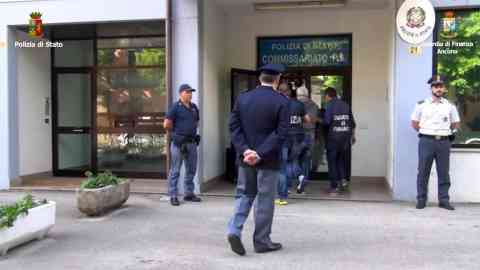 The arrest of a person during a police operation against a network allegedly aiding and abetting illegal immigration | PHOTO: ANSA/POLIZIA DI STATO