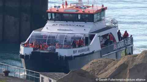 A group of people thought to be migrants are brought in to Dover, Kent, onboard a Border Force vessel following a small boat incident in the Channel, July 20, 2024 | Photo: Gareth Fuller / empics / picture alliance