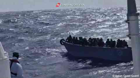 A still from a video from the Italian coast guard shows a boat with migrants on board as the coast guard nears to start the rescue operation on April 10 | Source: Italian coast guard video still www.guardiacostiera.gov.it