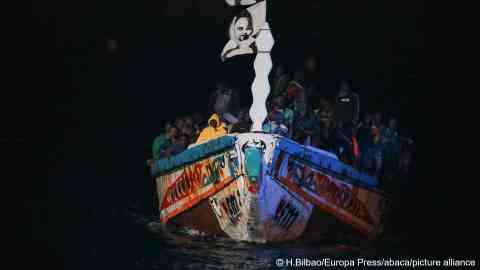 From file: Migrants arrive on board a traditional fishing boat in the Canary Islands in November 2023 | Photo: Europa Press/ABACA / picture alliance