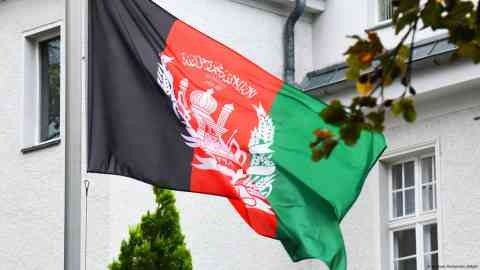 An act of defiance: Many Afghan embassies abroad still fly the flag of the old Afghan government which ruled prior to the 2021 Taliban takeover | Photo: Winfried Rothemel/IMAGO