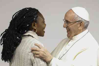 Pope Francis greeting Blessing Okoedion, who was a victim of human trafficking, during a pre-synod meeting with young people at Collegio Maria Mater Ecclesiae | Photo: Archive/ANSA/Fabio Frustaci