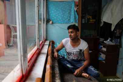 Adil Hussain is from Pakistan. The 44-year-old believes his brother was on board the ship which sank off the coast of Greece on June 14 | Photo: Stelios Misanas / Reuters