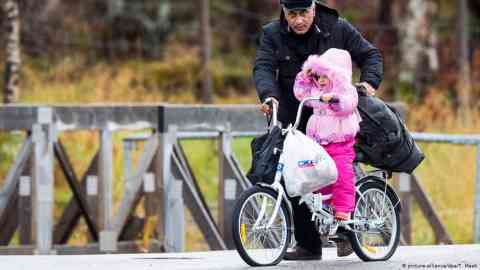 From file: Migrant man and child in Norway | Photo: picture alliance/T. Meek