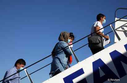 File photo used for illustration: People board an Aegean Airlines aircraft at the Eleftherios Venizelos International Airport in Athens, Greece, 24 July 2020 | Photo: Reuters/C. Baltas