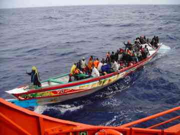 Spain's maritime rescue service is seen assisting a migrant boat in the Atlantic - but such patrols cannot reach every shipwreck in the midst of a vast ocean | Photo: Sasemar