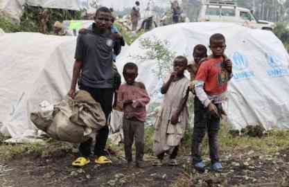 Picture shows Jimmy Lazaro, father of six children, as he seeks safety in a location for IDPs near Goma after his wife was killed by bombing in Sake, in the North Kivu province. | Photo: UNHCR/BLAISE SANYILA