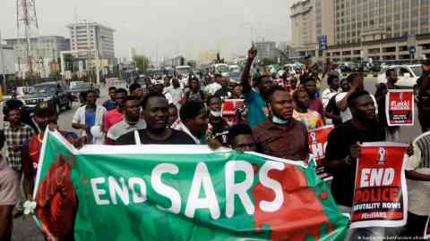 File photo used for illustration: The woman identified as "OO" says she took part in the "End SARS" protests in Nigeria in 2020, during which dozens of people fighting against police corruption were killed | Photo: Sunday Alamba/AP/picture alliance