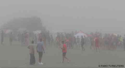 Migrants swim in misty weather to El Tarajal beach in Ceuta on August 25, 2024 in this still image obtained from a video | Photo: FARO TV/via Reuters