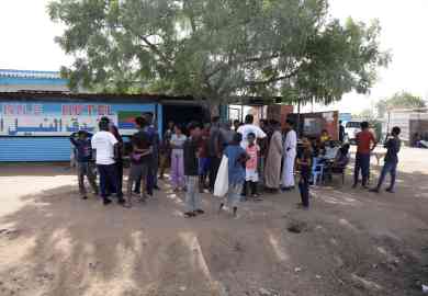 From file: Eritrean refugees who fled the conflict in Sudan are seen outside the White Nile Hotel in the Upper Nile State town of Renk, South Sudan, on May 13, 2023 | Photo:  EPA/AMEL