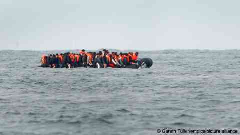 File photo: Migrants crossing the Channel in a small boat traveling from the coast of France towards the UK in August
2023 | Photo: Gareth Fuller/empics/picture alliance