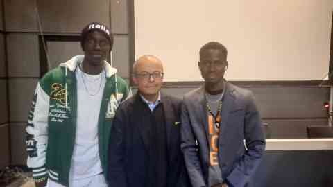 This picture shows Senegal's Alaji Diouf (l/), lawyer Francesco Romeo (c.) and Gambia's Bakary Cham (r.) after the presentation of Matteo Garrone's film 'Io capitano' in Rome on December 21, 2023 | Photo: ANSA