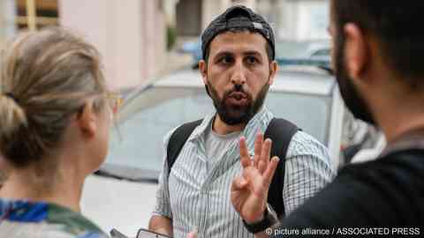 Kassem Abo Zeed came to Kalamata, Greece, from Germany to search for his wife Ezra and her brother who went missing in the shipwreck | Photo: picture alliance/ASSOCIATED PRESS/Thanassis Stavrakis