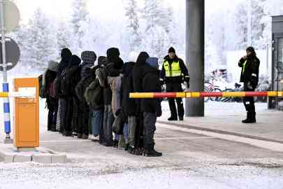 Migrants at the international border crossing at Salla, northern Finland, on November 22, 2023. | Photo: Jussi Nukari, AFP 