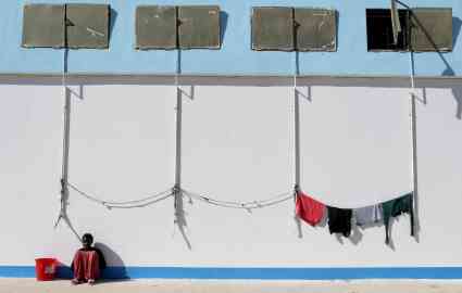 File photo used as illustration: A migrant sits in the street in Benghazi, eastern Libya | Photo: Reuters