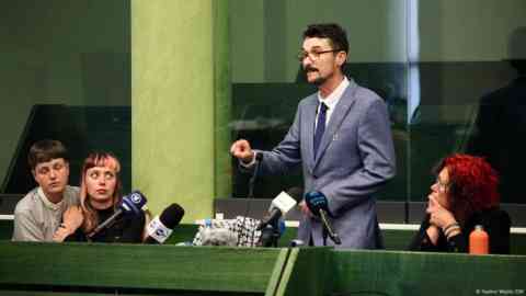 The defendant Mariusz Chyzynski, flanked by three of his co-defendants, at the court in Bialystok | Photo: Nadine Wojcik/DW