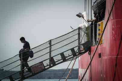 The picture shows a moment of the disembarking in the port of Savona of 146 migrants rescued in the Central Mediterranean by the ship Life Support, Savona, 10 August 2025 | Photo: ANSA/CESARE ABBATE