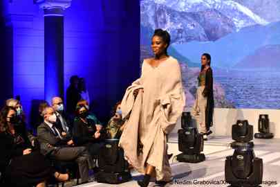 Several migrants shared their designs and creations at a fashion show held at Sarajevo's city hall | Photo: Nedim Grabovica/Xinhua/Imago Images