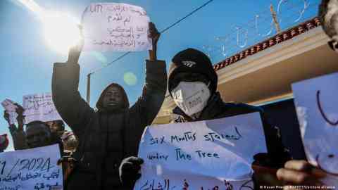 Migrants in Tunisia, predominantly hailing from sub-Saharan countries, have recounted serious cases of human rights abuses in a recent report by Amnesty International. Seen here protesting for UN protection [FILE: January 25, 2024] | Photo: Hasan Mrad/ZUMAPRESS/picture alliance