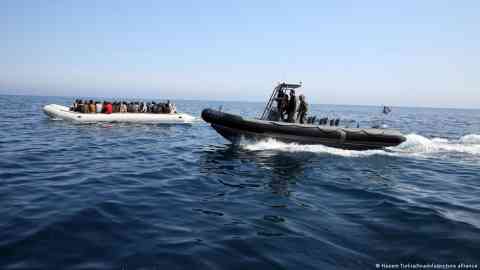 A Libyan coastguard boat is seen here stopping a boat of African migrants [FILE: Jun 6, 2015] | Photo: Hazem Turkia/Anadolu/picture alliance