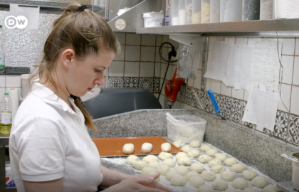 Irina has a large family to support. She found a job in a Berlin restaurant | Screengrab from DW 'Made in Germany' video: 'How can Ukrainian women find work in Germany?'