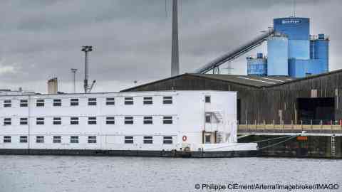 The 'Ponton Reno', a canal barge, is being used as accommodation for 250 asylum seekers in Ghent, Belgium. Photo dated September 24, 2023 | Photo: Philippe ClÈment / IMAGO 