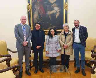 Syrian student Rim meets the University of Siena's Dean Roberto Di Pietra, Professor Federico Lenzerini, and General Director Emanuele Fidora and Professor Vanna Micheli of the NGO Caritas in Siena |  Photo: Siena University
