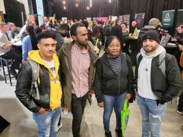 Lamine Messaoudi (right) at a job fair in Oulu, Finland on September 25, 2024 | Photo: Benjamin Bathke/InfoMigrants