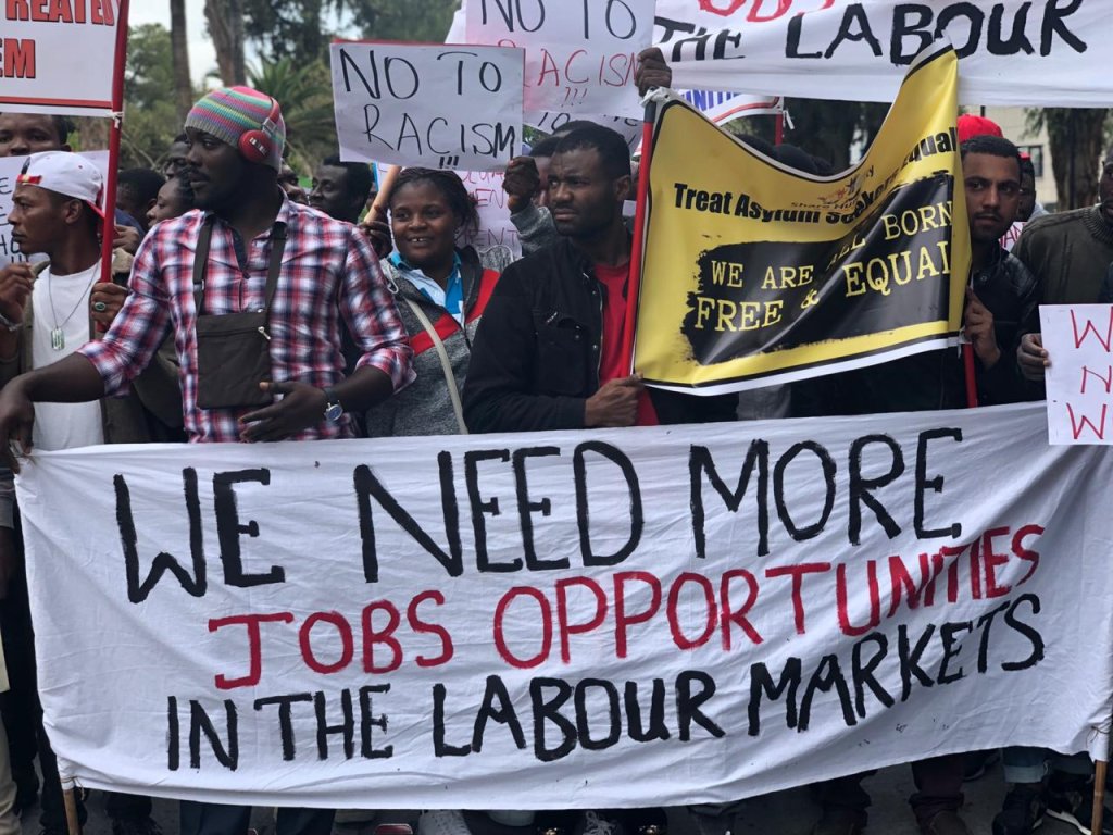 ‘Like living in hell’ Asylum seekers protest at the lack of job