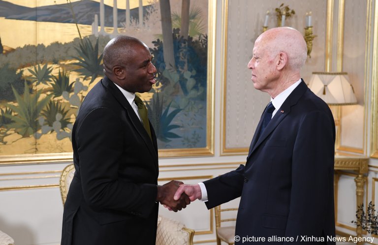 The UK's Foreign Secretary David Lammy (L) shakes hands with Tunisian President Kais Saied (R) during his visit at the end of January | Photo:Tunisian Presidency/ Handout via Xinhua